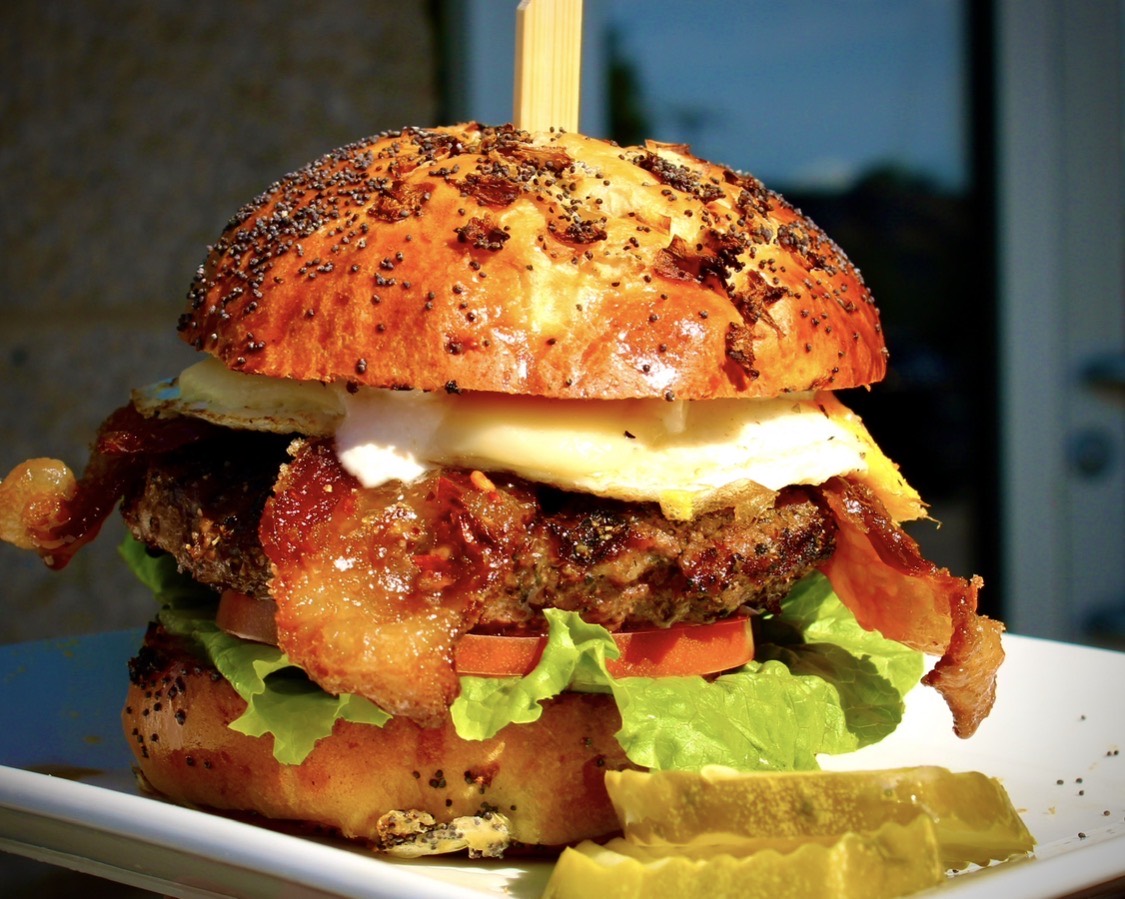 Stone Grille burger with bacon and a fried egg